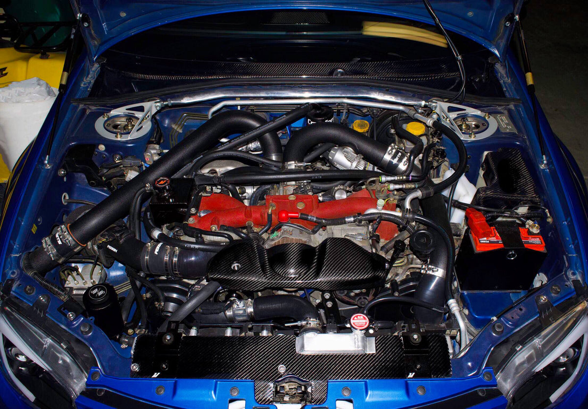 MeLe Design Firm 2002-2007 Subaru WRX/STI 600 Series battery mount installed in engine bay, showcasing durable metal construction.