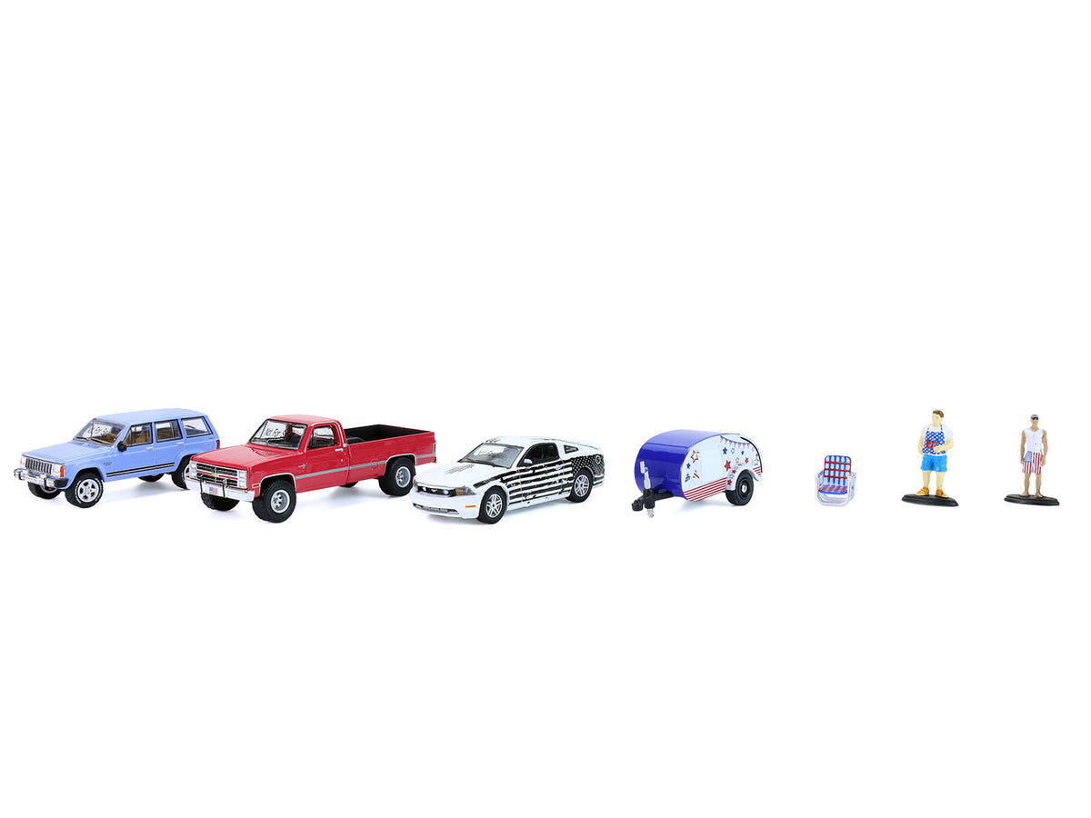 Set of seven 1/64 scale diecast model cars from the Summer Cookout Diorama by Miniature Motors, displayed in a realistic scene.