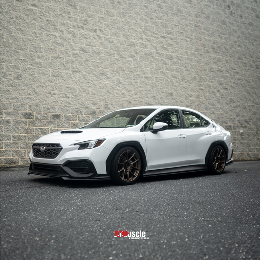 JDMuscle Tanso carbon fiber rear spats for 2022-2025 Subaru WRX, OE+ style rear lips with sleek aerodynamic design.