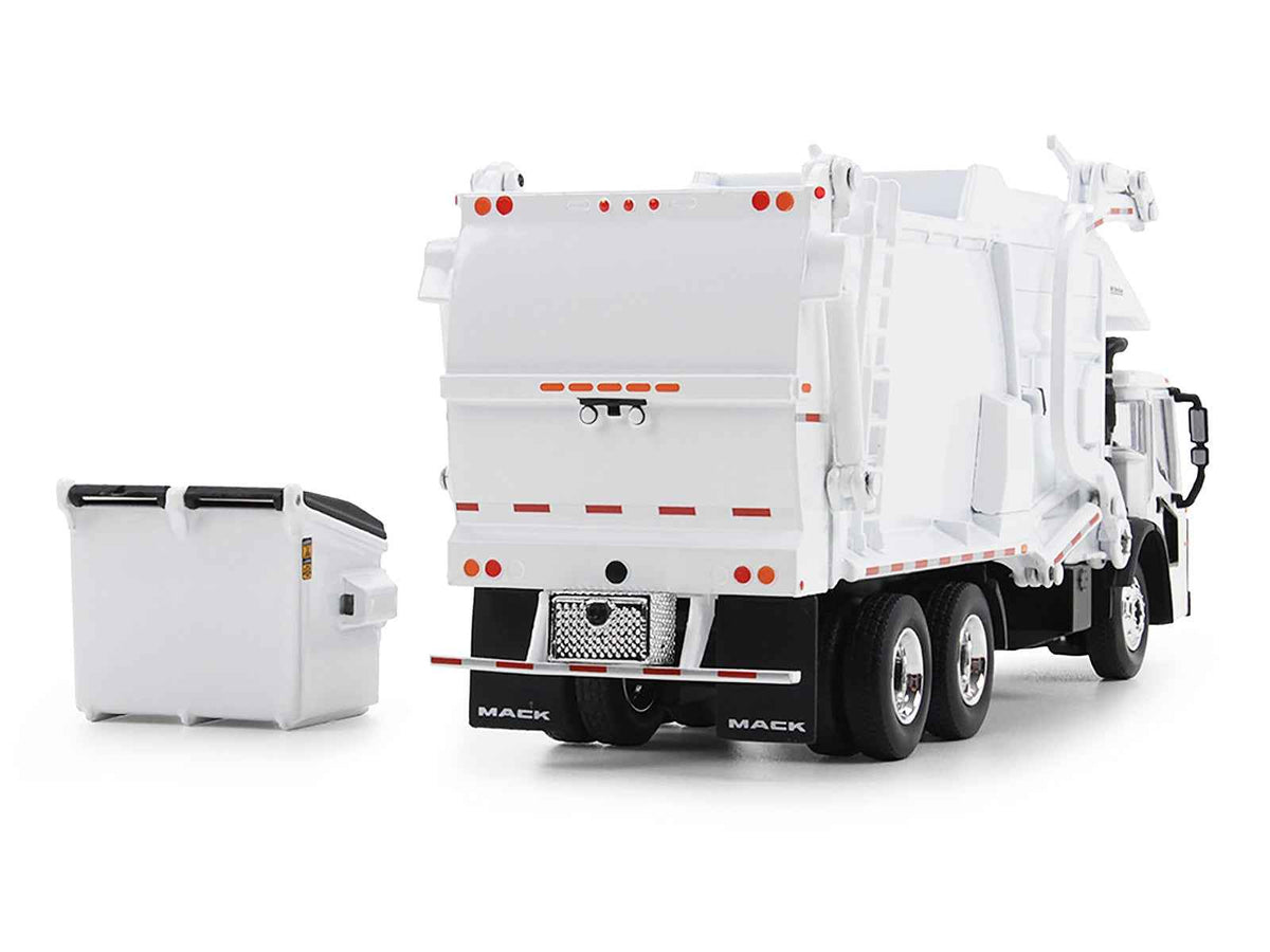 Miniature Motors Mack LR refuse garbage truck diecast model with McNeilus Meridian front loader and trash bin, white, 1/64 scale.