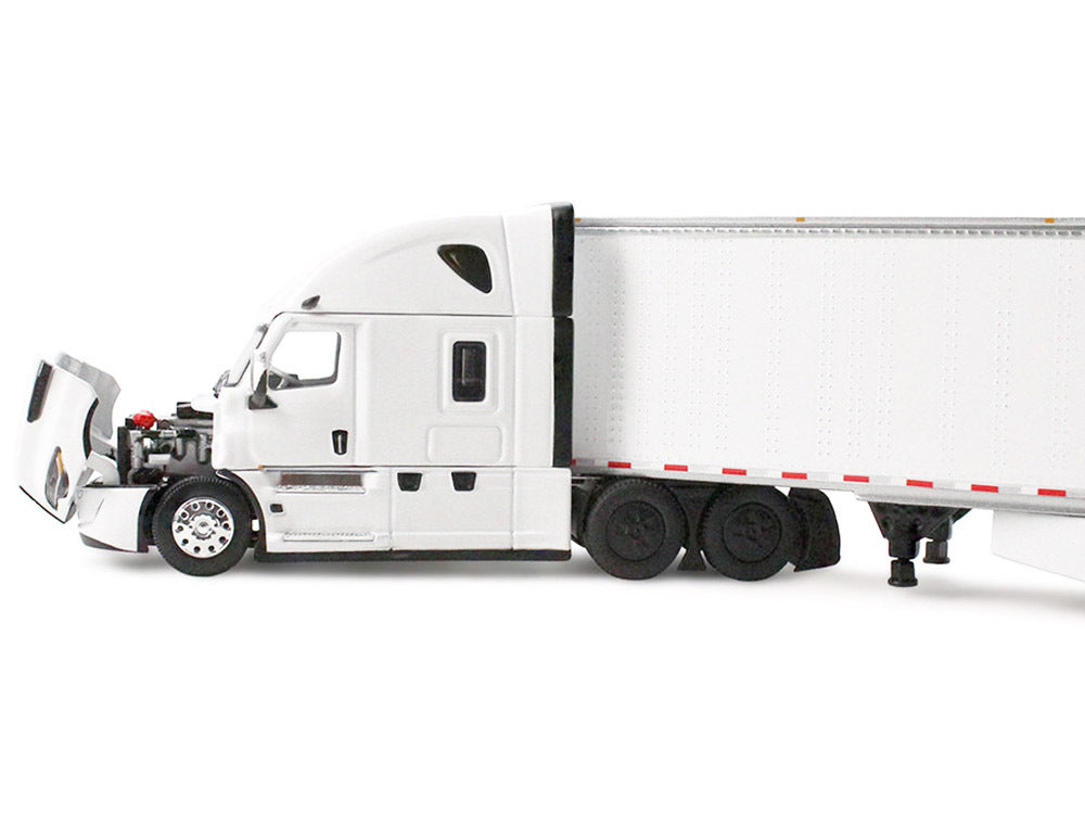 White Freightliner Fifth Generation Cascadia sleeper truck with 53' utility trailer, diecast model by DCP/First Gear, miniature size.