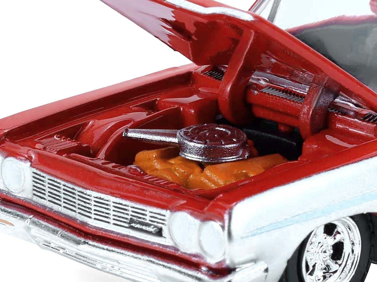 Miniature Motors 1964 Chevrolet Biscayne lowrider diecast model in silver and red, part of California Lowriders Series, 1/64 scale.