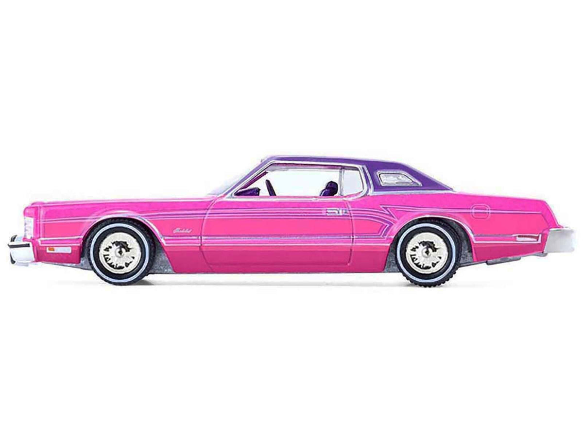 Miniature Motors 1/64 diecast Ford Thunderbird Lowrider model in pink metallic with purple top, graphics, and interior.
