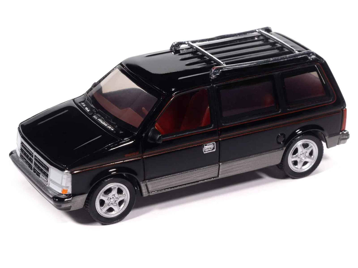 Black 1989 Dodge Caravan Turbo diecast model by Miniature Motors, with red stripes and detailed interior, part of Mighty Minivans series.