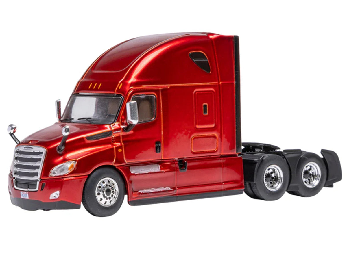Red metallic 1/64 scale Freightliner Cascadia diecast truck model by IXO Models, detailed miniature truck tractor.