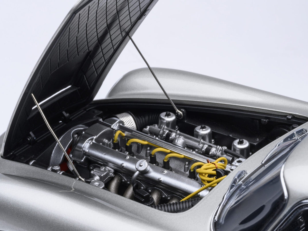 Aston Martin DB5 RHD model car by Autoart in Birch Silver, 1/18 scale, detailed miniature collectible from Miniature Motors.