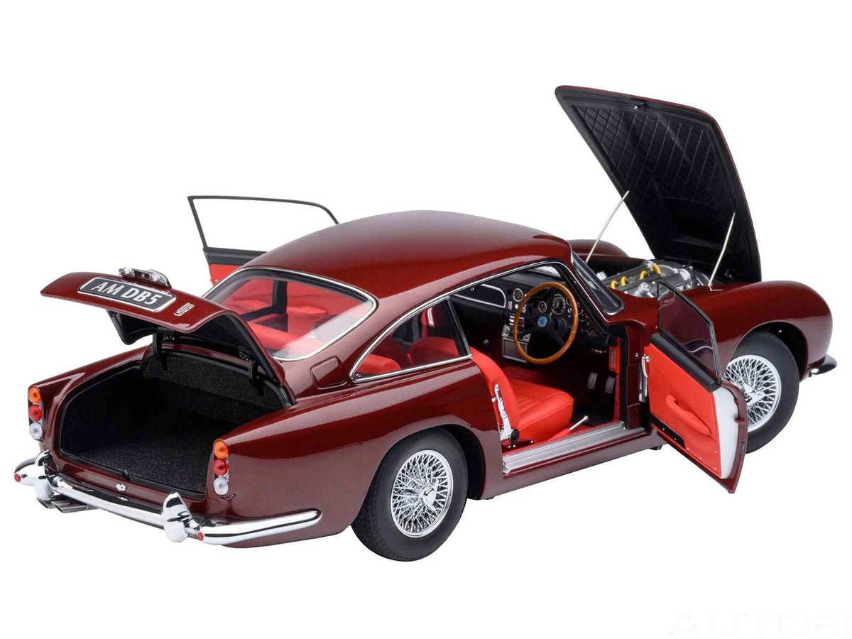 Miniature Aston Martin DB5 RHD model car by Autoart, Dubonnet Rosso Red Metallic, 1/18 scale, detailed collectible car model.