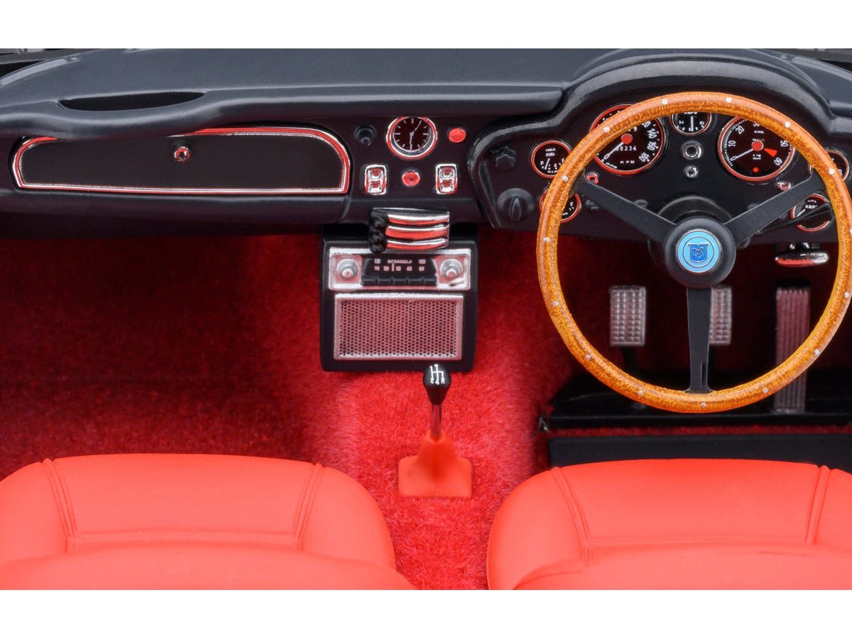 Aston Martin DB5 RHD model car by Autoart in Dubonnet Rosso Red Metallic, 1/18 scale, detailed miniature vehicle.