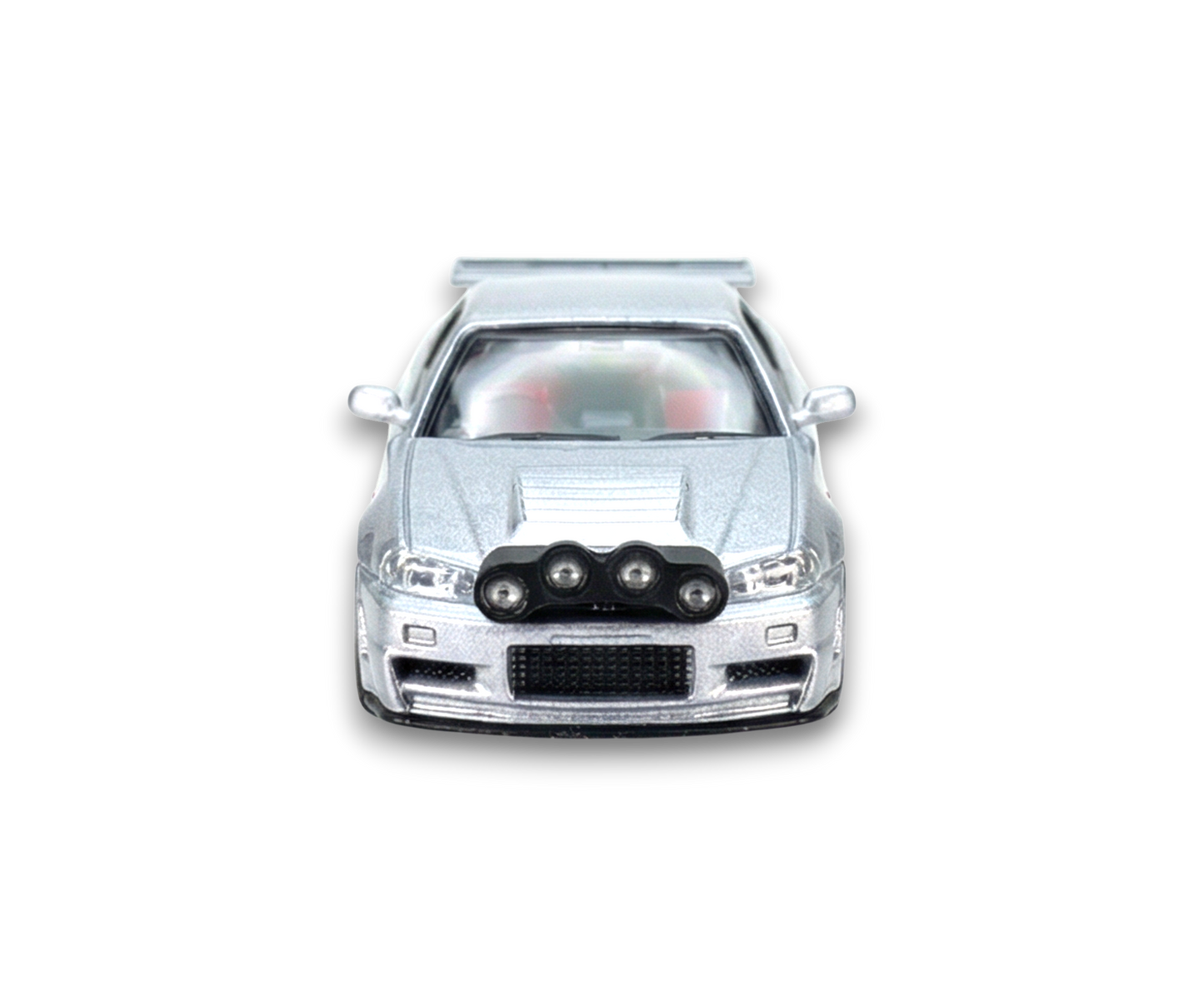 Silver Nissan R34 GT-R diecast model from Lot57Supplies, detailed 1:64 scale street weapon with snow drift design.