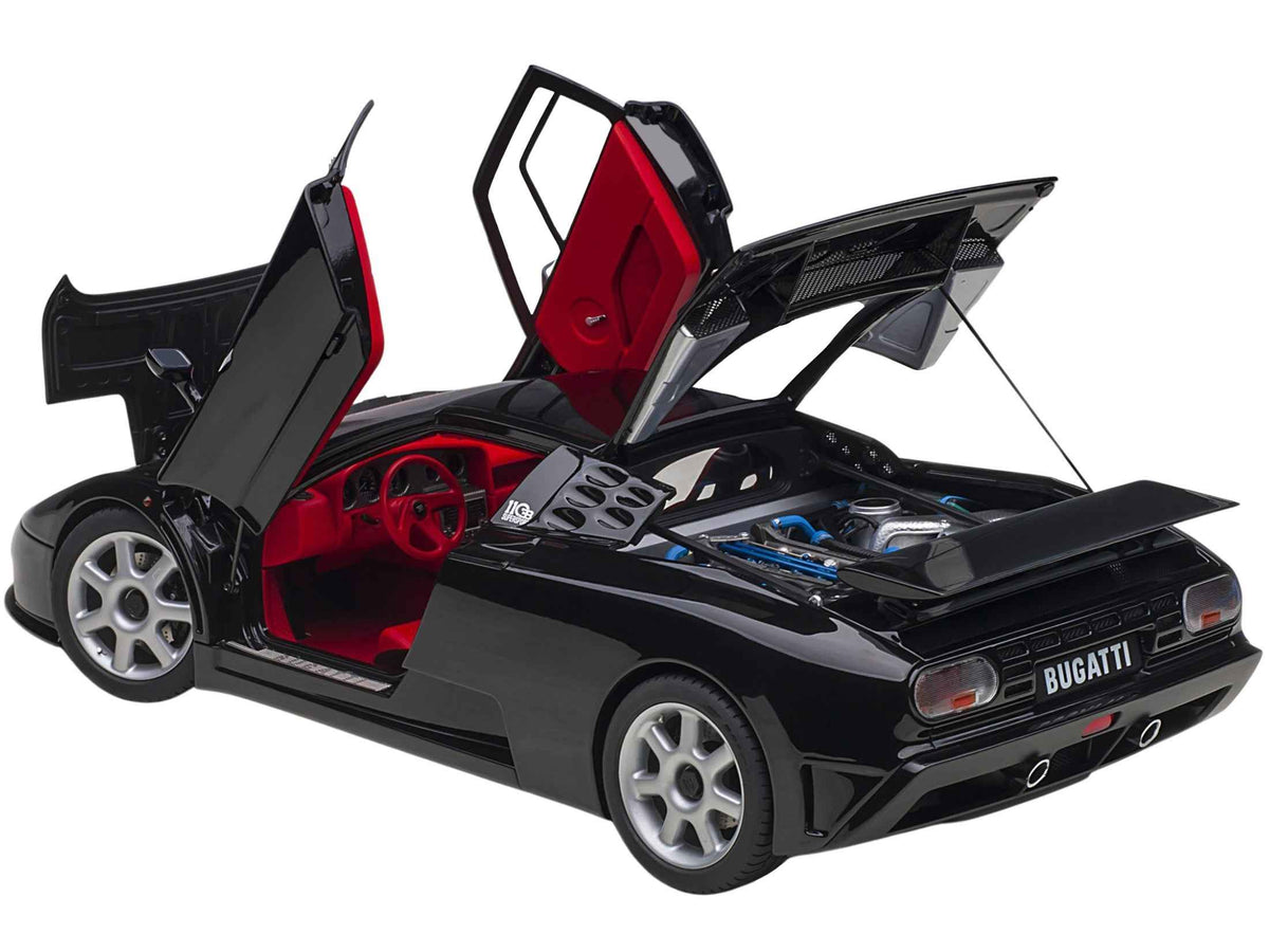 Miniature Bugatti EB110 SS Super Sport model car in black with red interior and silver wheels by Autoart, 1/18 scale.