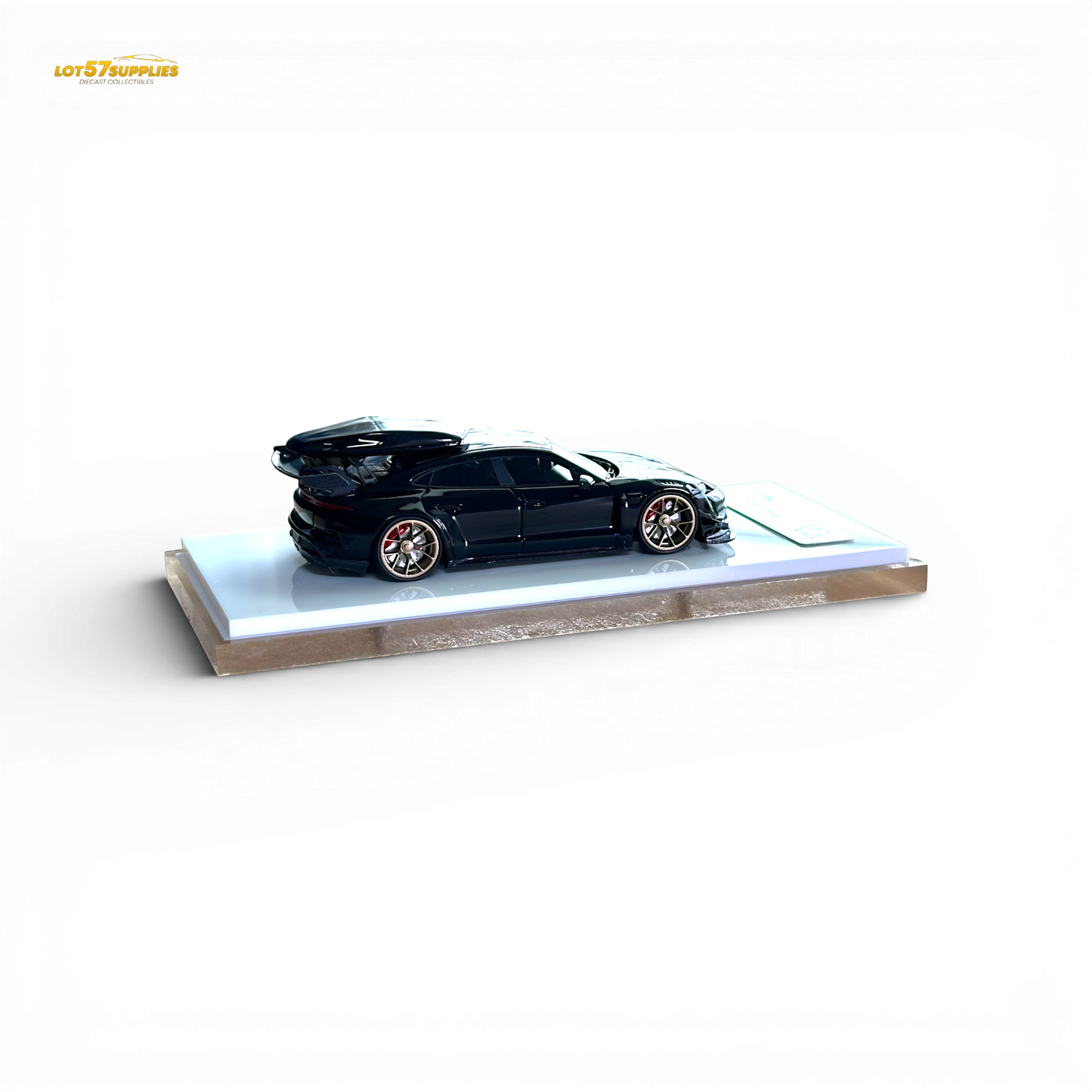 Diecast Porsche Taycan 1:64 scale model in black with roof box, detailed miniature replica from Lot57Supplies Diecast Shop
