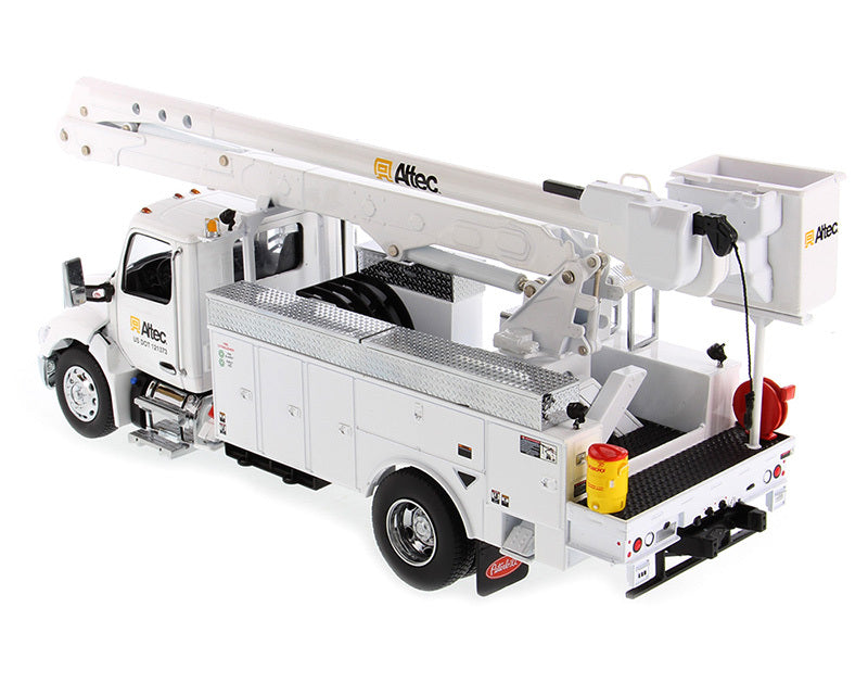 White Peterbilt 536 truck diecast model with Altec AA55 aerial service body, detailed miniature truck by Diecast Masters.