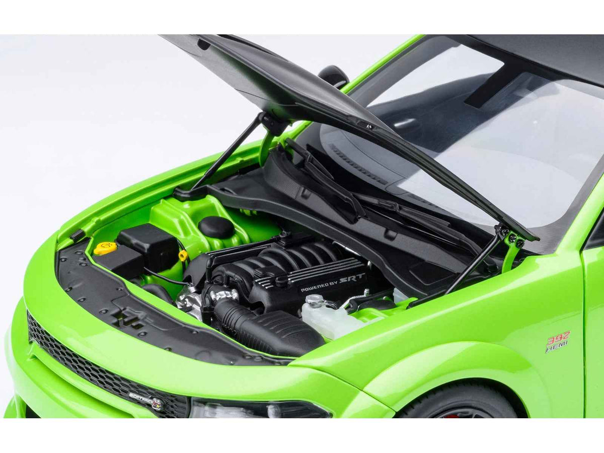 Miniature Dodge Charger Scat Pack Widebody model car in Sublime Green with matte black hood and roof by Autoart, 1/18 scale.