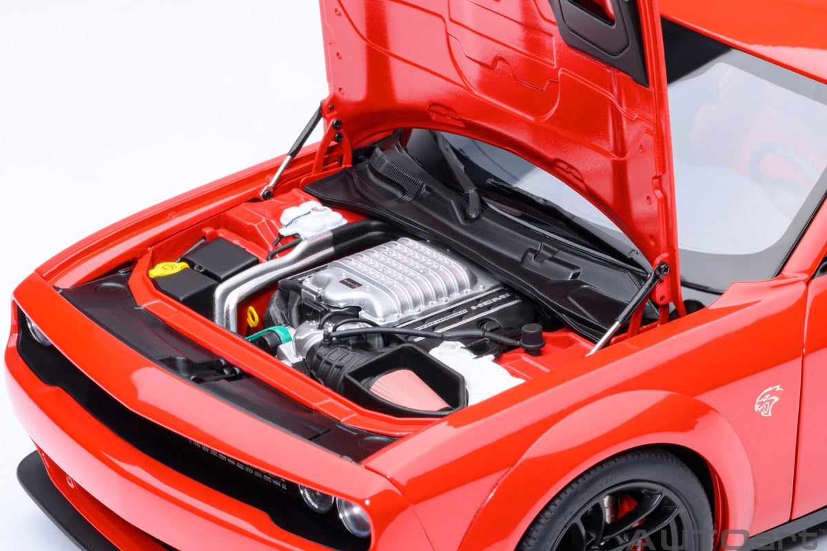 Miniature Dodge Challenger SRT Jailbreak Torred model car with red interior, 1/18 scale, by Autoart, detailed collectible display piece.