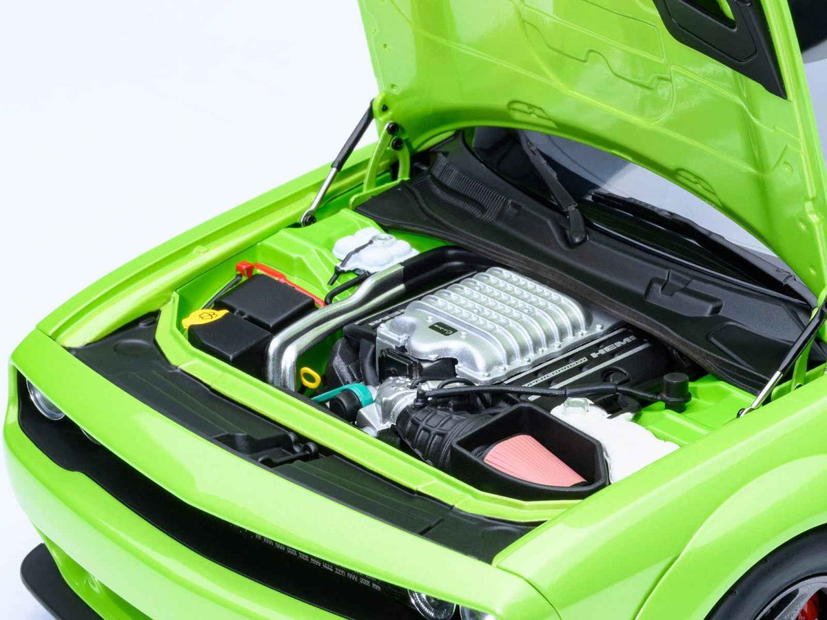 Miniature Dodge Challenger SRT Super Stock model car in Sublime Green, 1/18 scale by Autoart, detailed collectible vehicle.