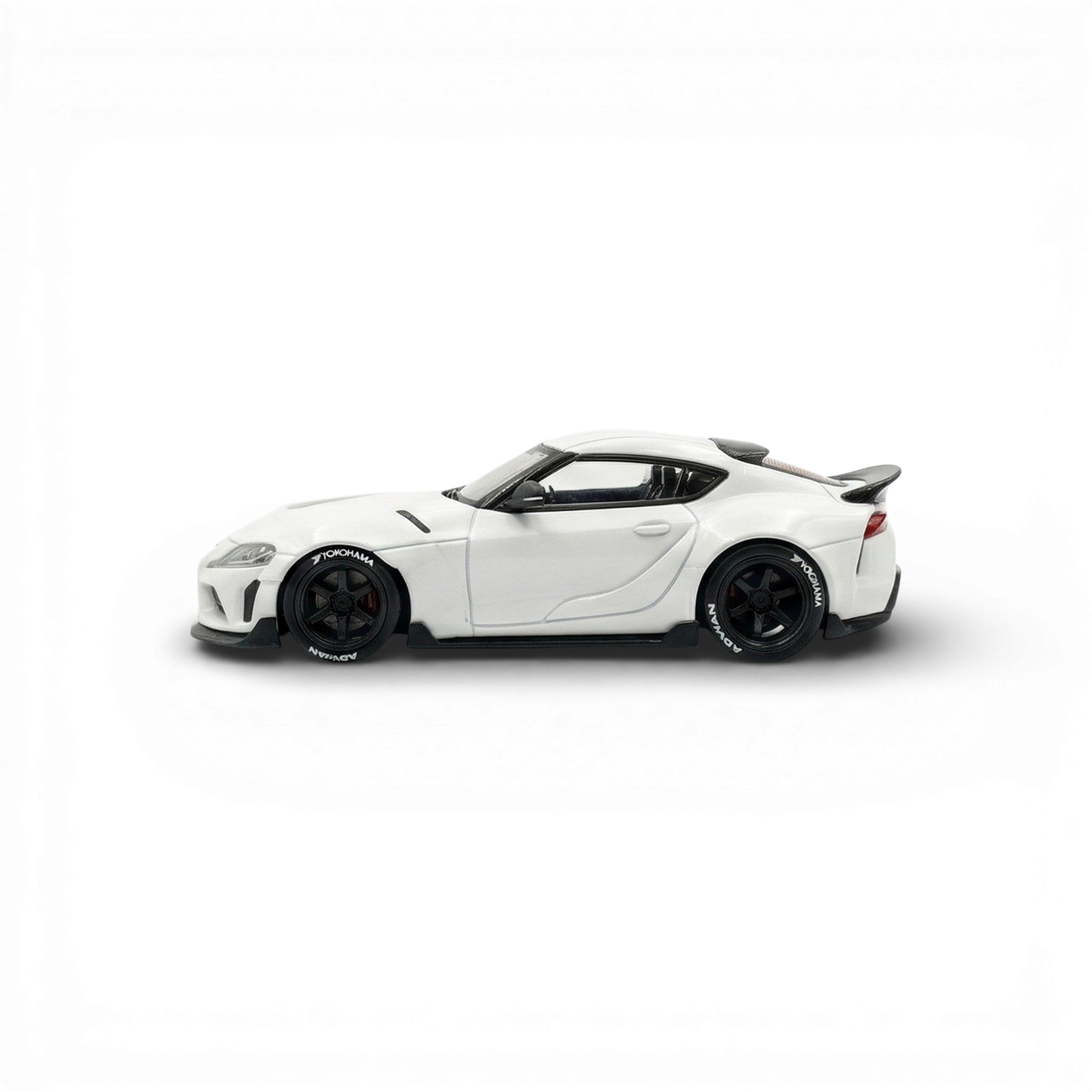 White Toyota Supra GR diecast model in 1:64 scale by ATOZ, detailed miniature car from Lot57Supplies Diecast Shop.