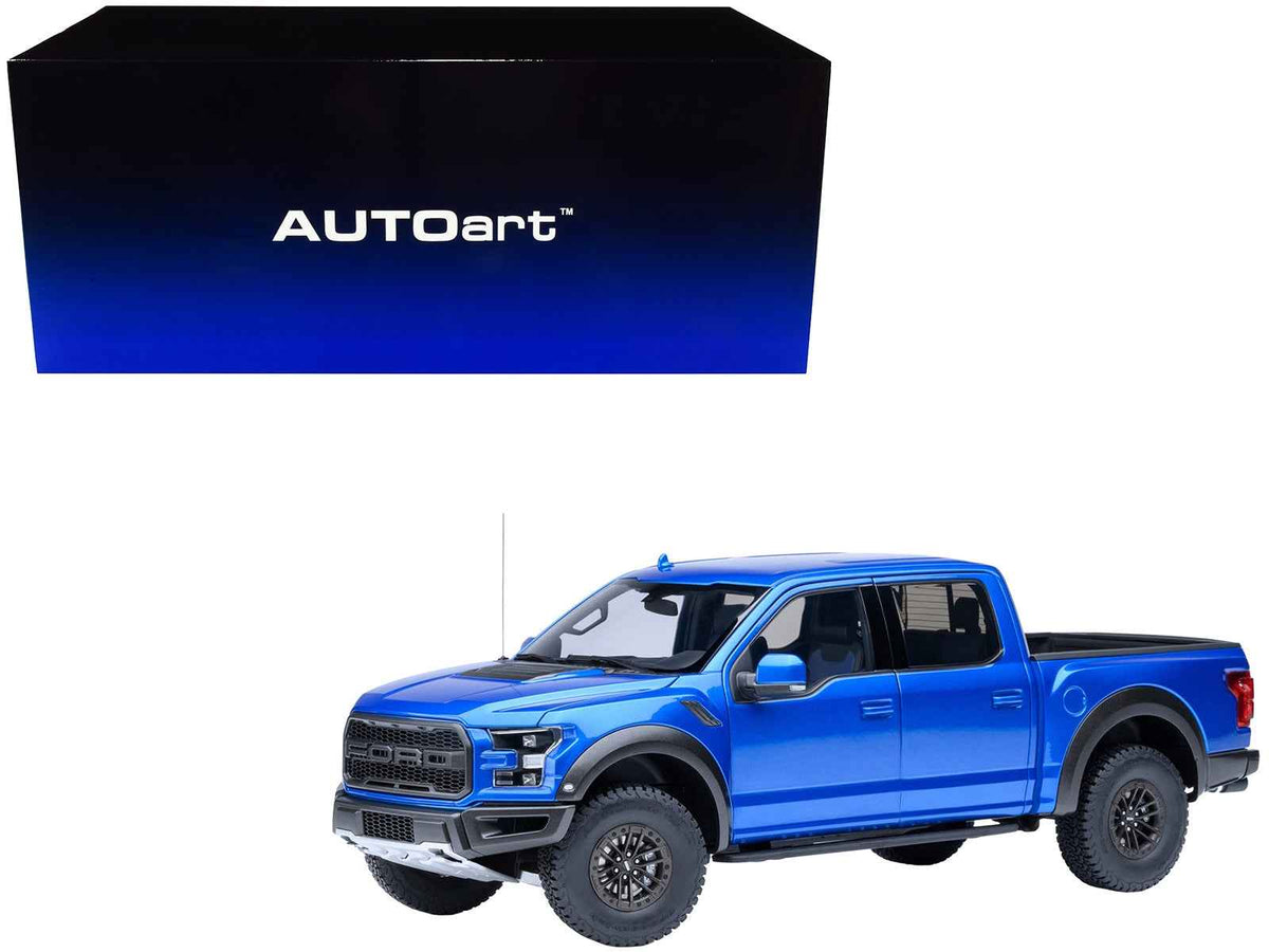 Miniature Motors 1/18 Ford F-150 Raptor pickup truck model in Velocity Blue, detailed auto art collectible car.