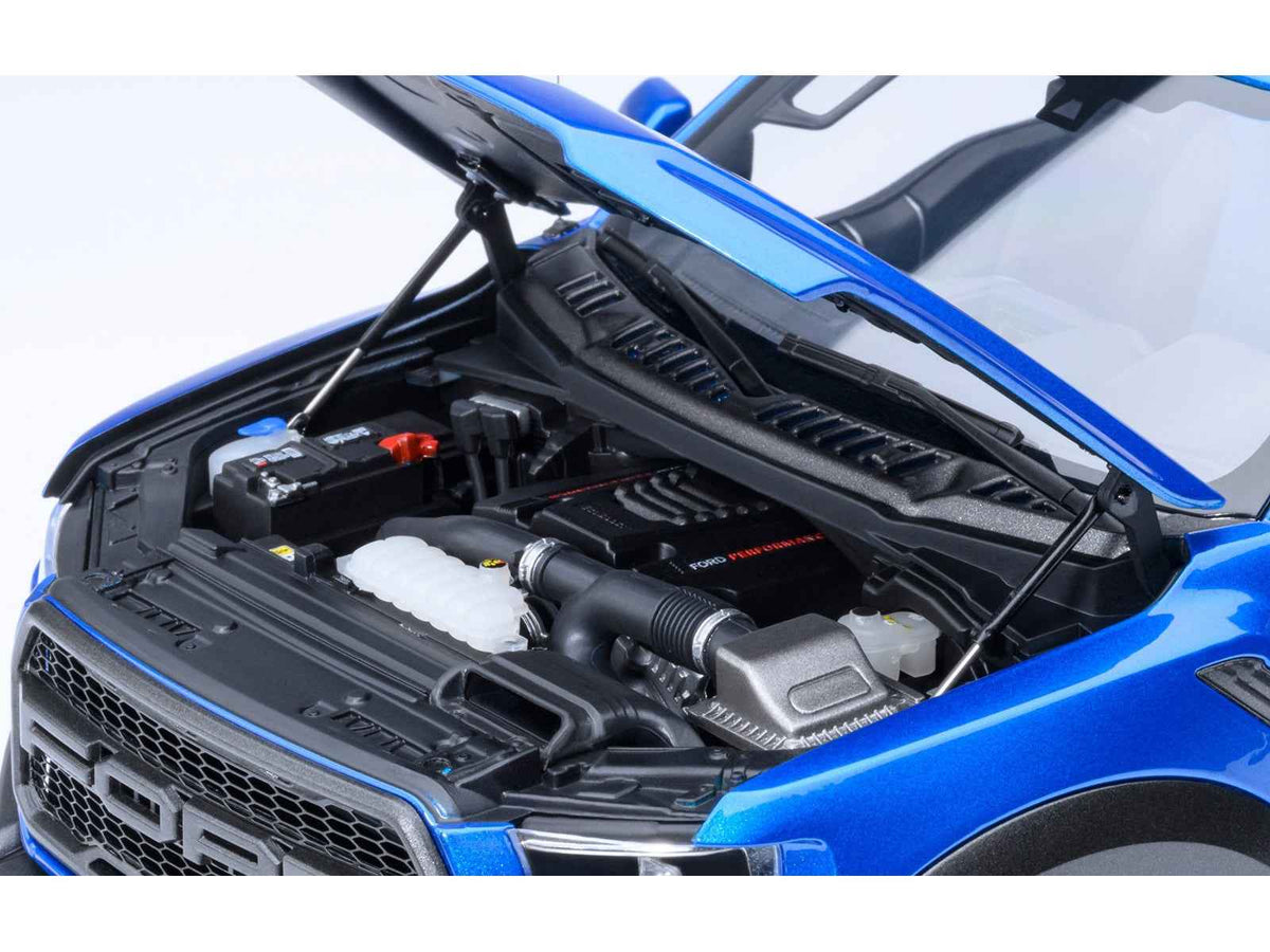 Miniature Motors 1/18 Ford F-150 Raptor pickup truck model in Velocity Blue, detailed replica by Autoart.
