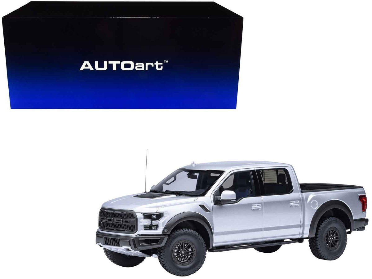 Miniature Motors 2019 Ford F-150 Raptor pickup truck model in Ingot Silver, 1/18 scale by Autoart, detailed collectible car.