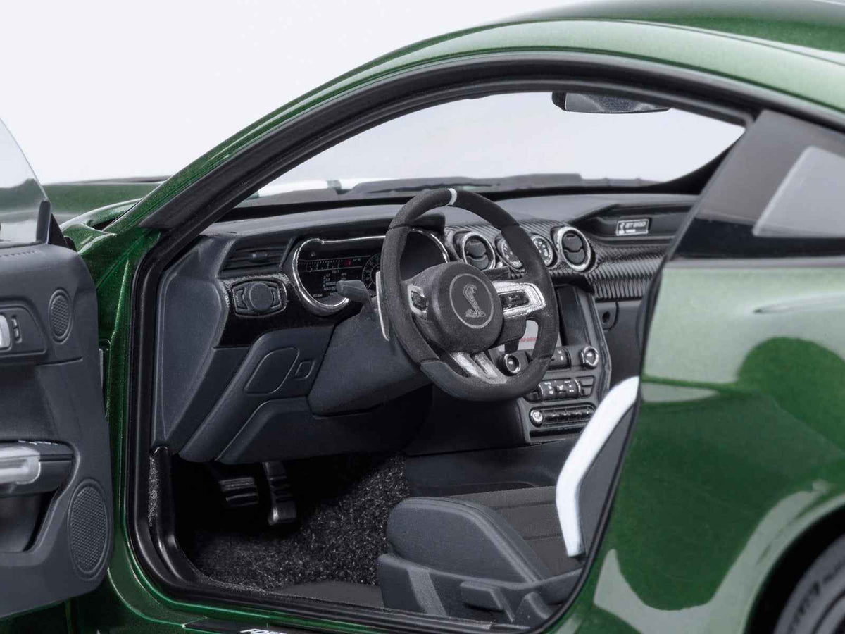 Miniature Ford Mustang Shelby GT500 model car in Eruption Green Metallic with white stripes by Autoart, 1/18 scale.