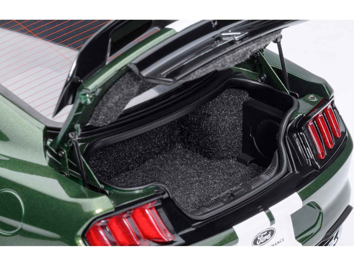 Miniature Ford Mustang Shelby GT500 model car in Eruption Green Metallic with white stripes, detailed 1/18 scale by Autoart.