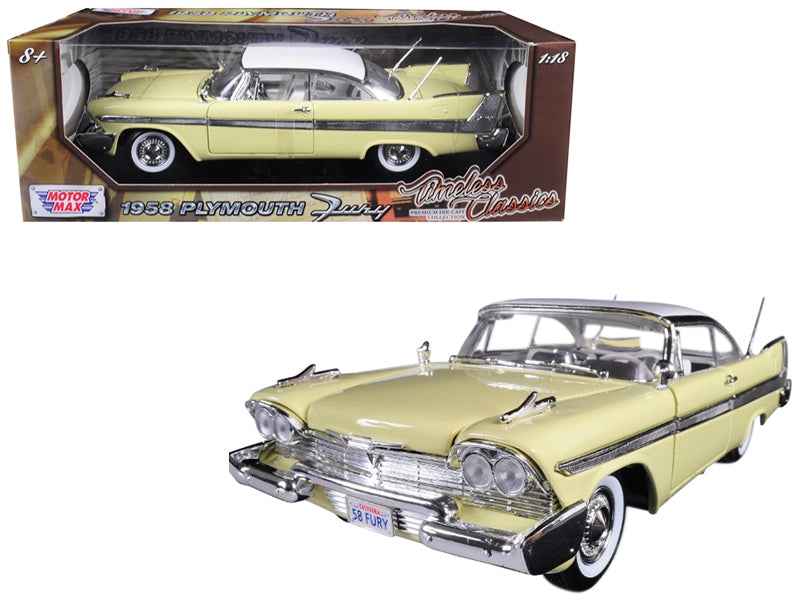 Yellow 1958 Plymouth Fury diecast model car by Miniature Motors, featuring a white top and detailed exterior, 1/18 scale.
