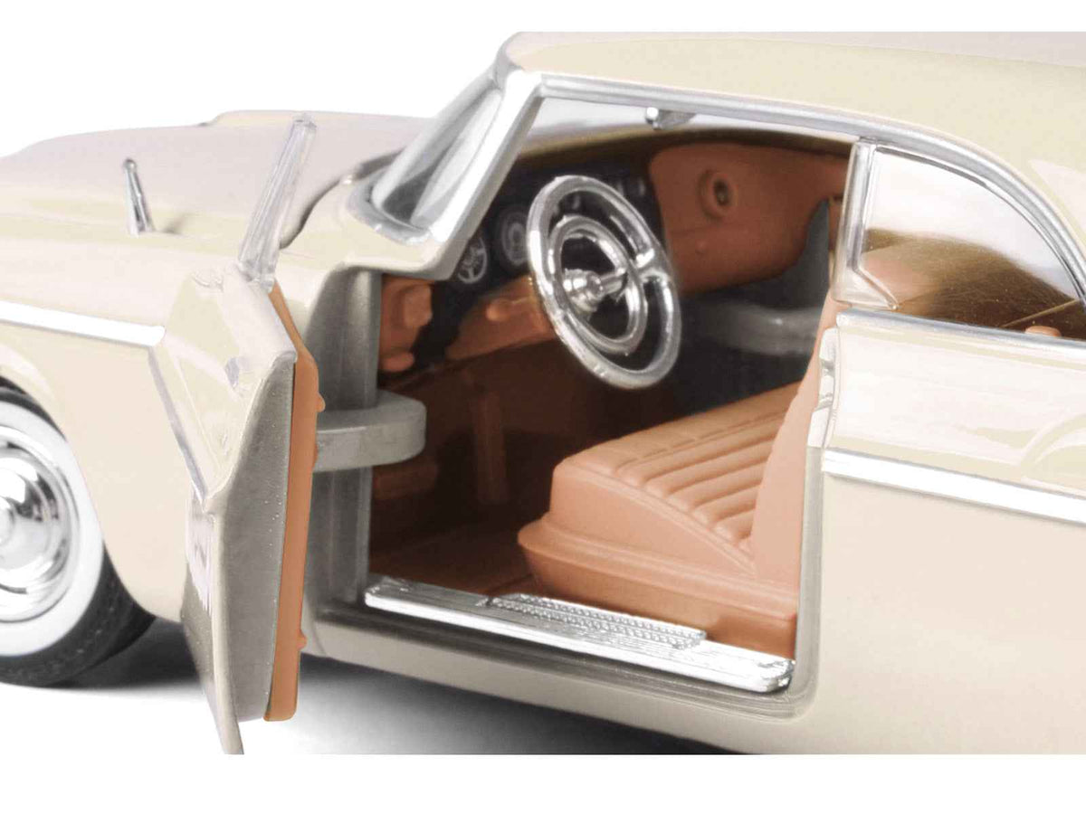 Cream 1955 Chrysler C300 diecast model car by Miniature Motors, detailed 1/24 scale Chrysler C300 collectible for display.