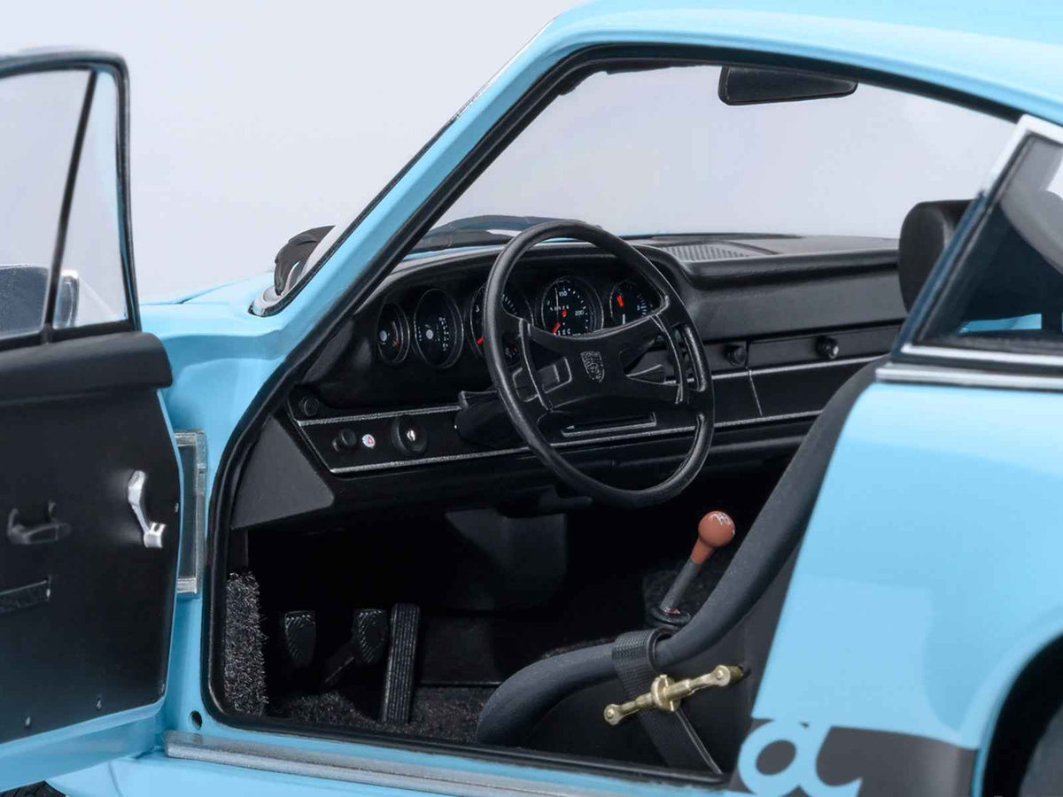 Miniature Porsche 911 Carrera 2.7 RS Gulf Blue model car with black stripes and wheels, 1/18 scale by Autoart