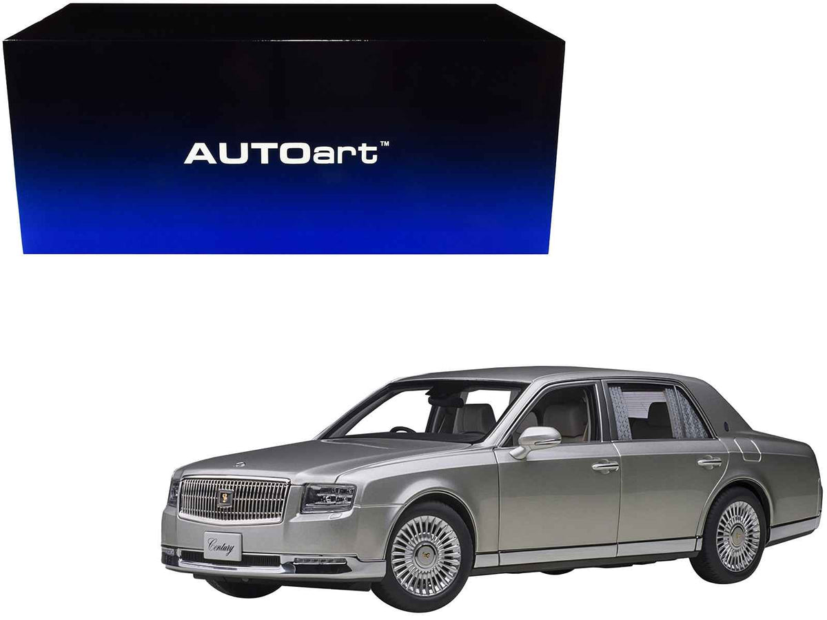 Silver Toyota Century RHD model car with curtains, 1/18 scale, by Autoart, featuring detailed miniature design and special edition details.
