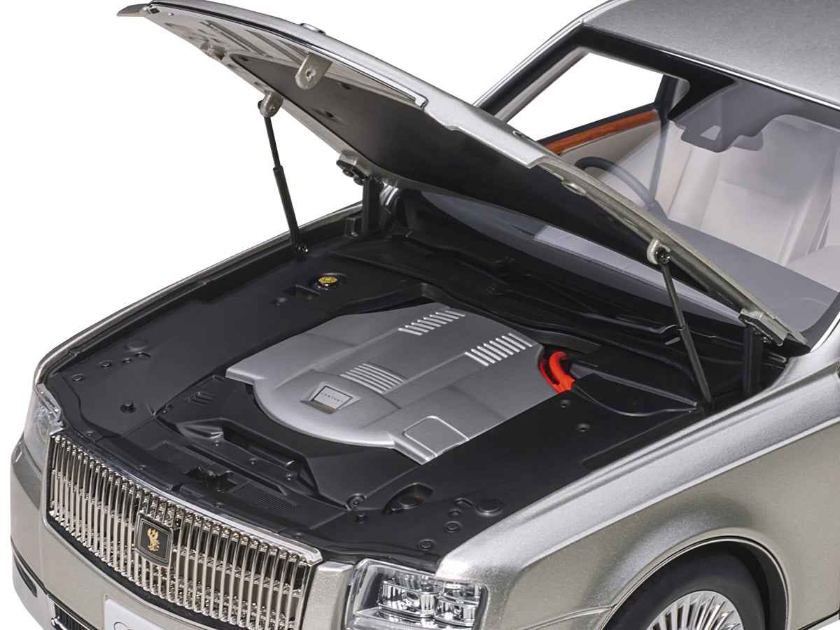 Silver Toyota Century model car with curtains, RHD, 1/18 scale, by Autoart, featuring detailed exterior in a special edition design.