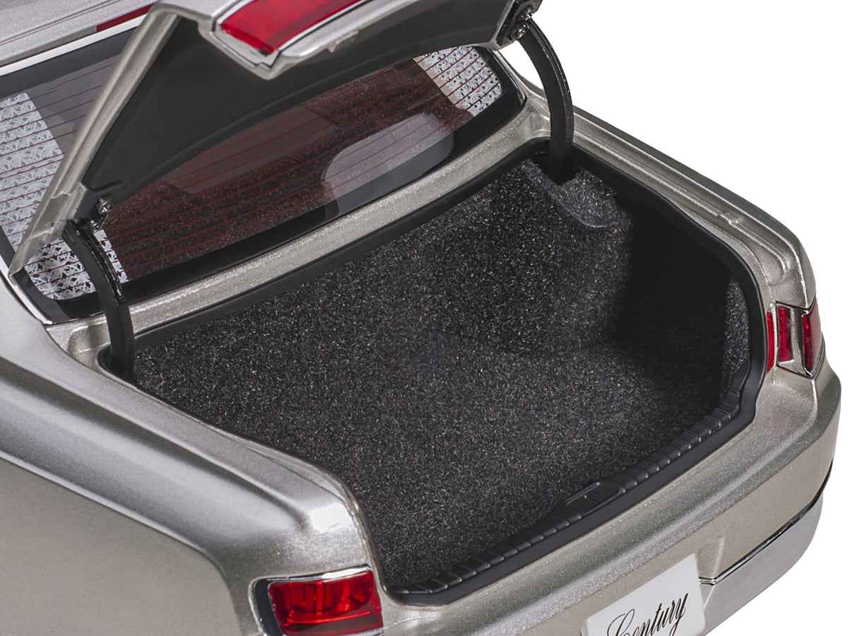Silver Toyota Century model car with curtains, right-hand drive, 1/18 scale by Autoart, showcasing detailed exterior and interior features.
