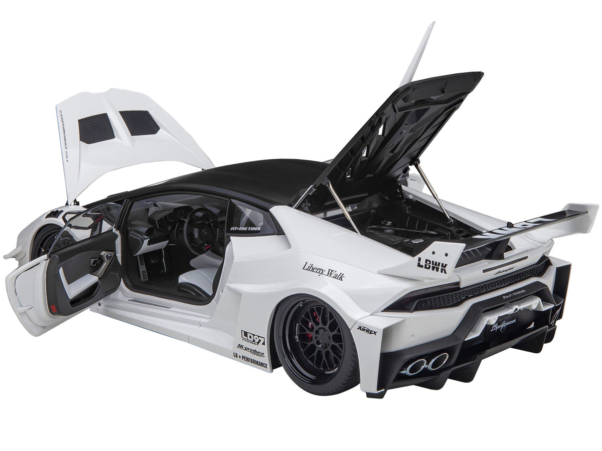 White Lamborghini Huracan GT "LB-Silhouette Works" 1/18 scale model car by Autoart, detailed miniature with black accents.