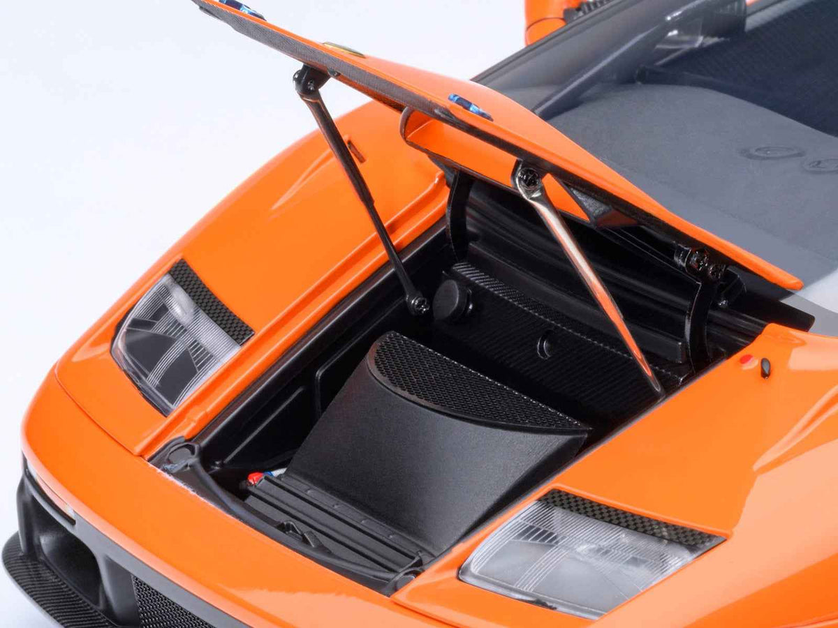Miniature Lamborghini Diablo GTR model car in Arancio Ishtar Orange by Autoart, detailed 1/18 scale Lamborghini model.