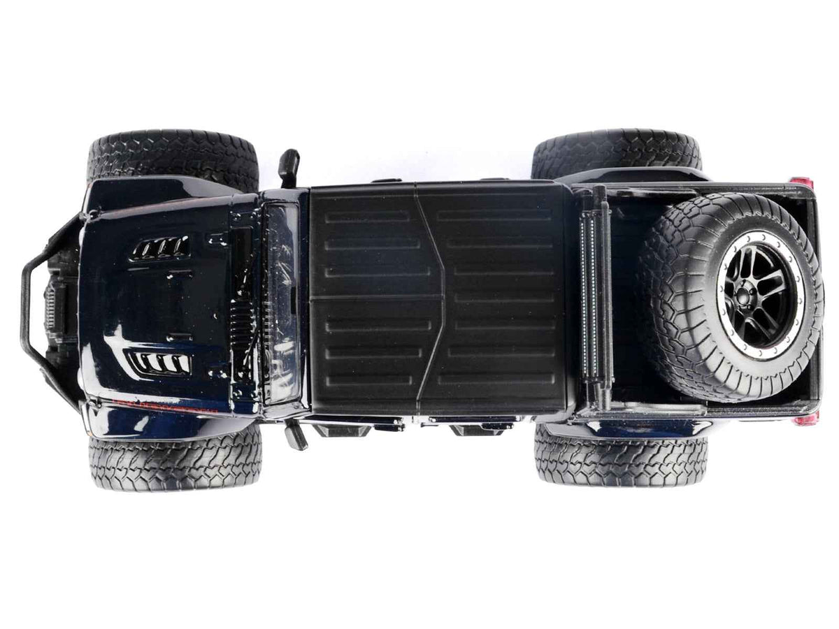 Miniature Motors 1/27 diecast model of 2021 Jeep Gladiator Rubicon off-road pickup truck in black with matte black top.