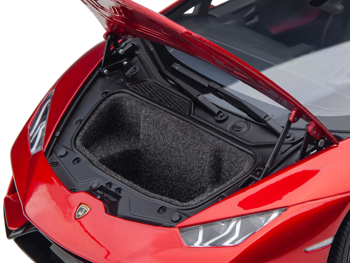 Miniature Lamborghini Huracan EVO Rosso Bia red metallic 1/18 scale model car by Autoart, detailed with realistic features.