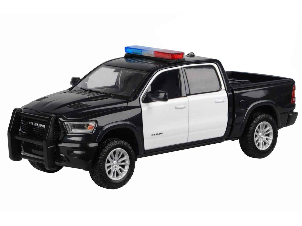 Miniature Motors 2019 RAM 1500 Laramie Crew Cab diecast model truck in black and white with flashing light bar and detailed lights