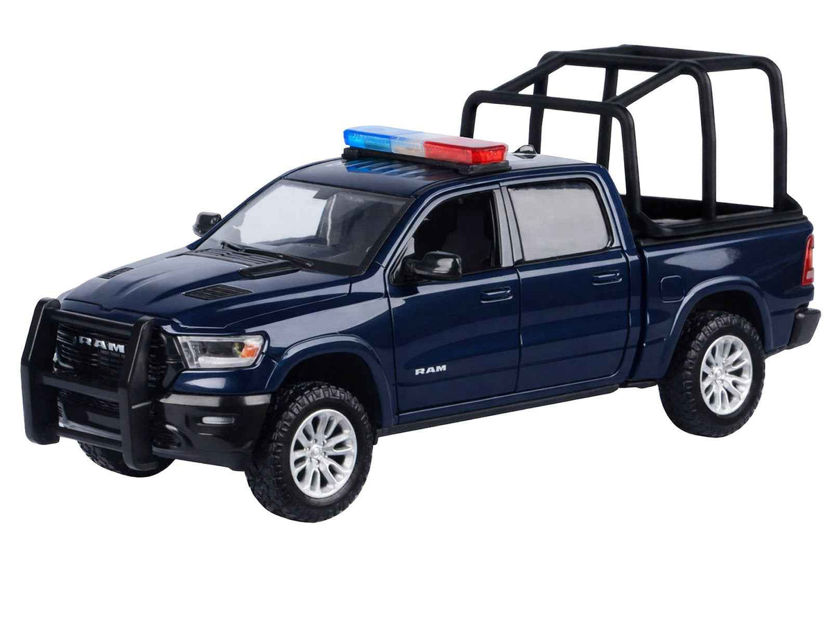 Dark blue 2019 RAM 1500 Laramie crew cab diecast model truck with flashing lights, front and rear lights, and sound by Miniature Motors