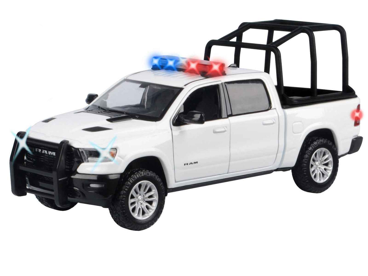 White 2019 RAM 1500 Laramie crew cab diecast model truck with flashing light bar, front and rear lights, and sound by Miniature Motors.
