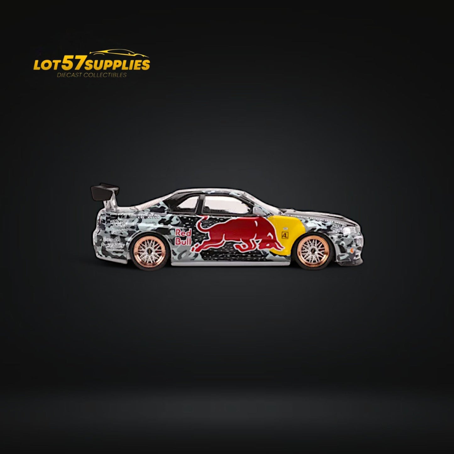 Diecast Nissan Skyline GT-R R34 Z-Tune in RB livery, 1:64 scale, featuring detailed design and vibrant racing graphics.