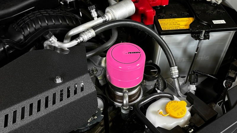 JDMuscle Perrin hyper pink oil filter cover for Subaru WRX, BRZ, and Toyota GR86 engine oil caps, vibrant pink finish.