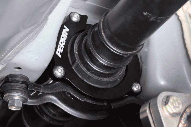 JDMuscle Perrin Driveshaft Lockdown for 2008-2025 Subaru WRX and STI, showing the metal locking component on a driveshaft