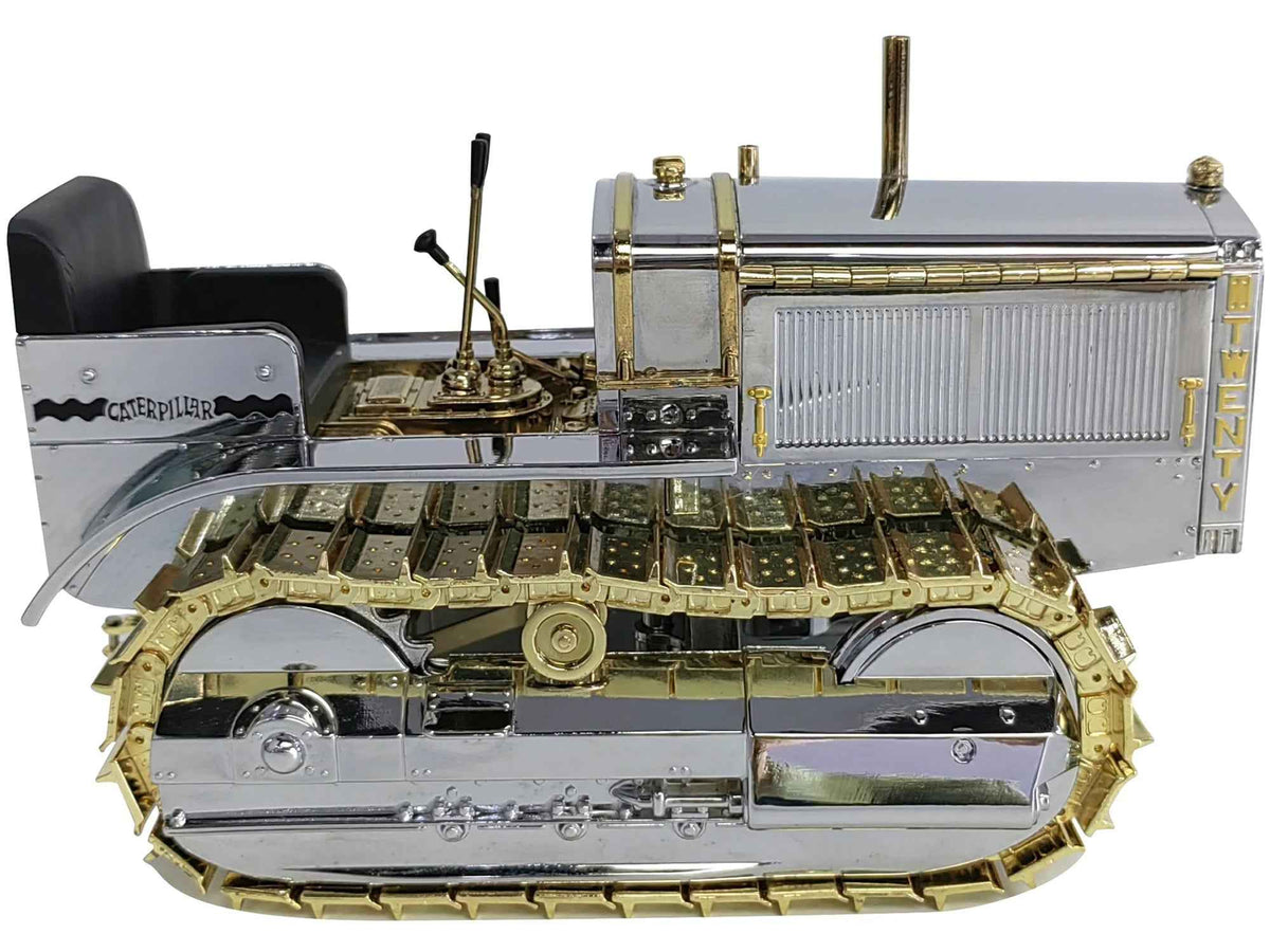Caterpillar Twenty Tractor diecast model by Diecast Masters, chrome and gold finish, 1/16 scale, part of the Centennial Series.