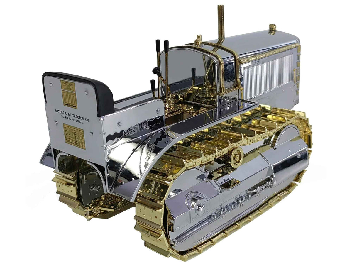 Caterpillar CAT Twenty Tractor diecast model in chrome and gold, part of the Centennial Series by Diecast Masters, 1/16 scale.