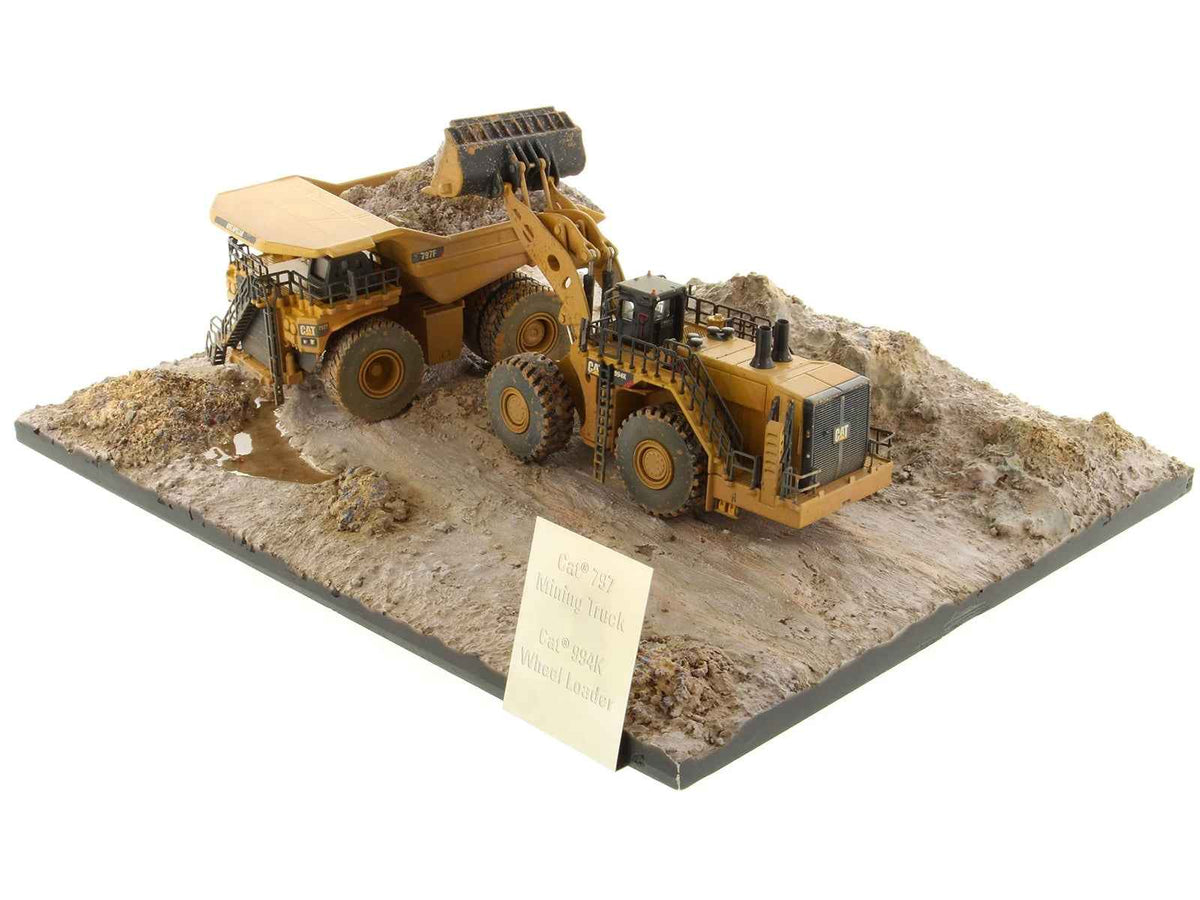 Weathered yellow CAT Caterpillar 994K wheel loader and 797 mining truck diecast models by Miniature Motors, set of 2.
