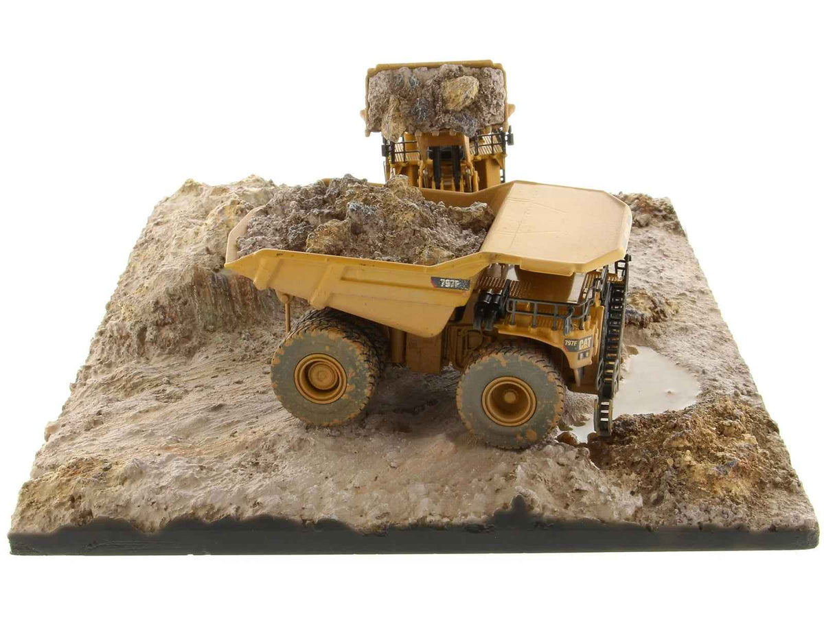 Weathered yellow Cat Caterpillar 994K wheel loader and 797 mining truck diecast models by Miniature Motors, set of 2.