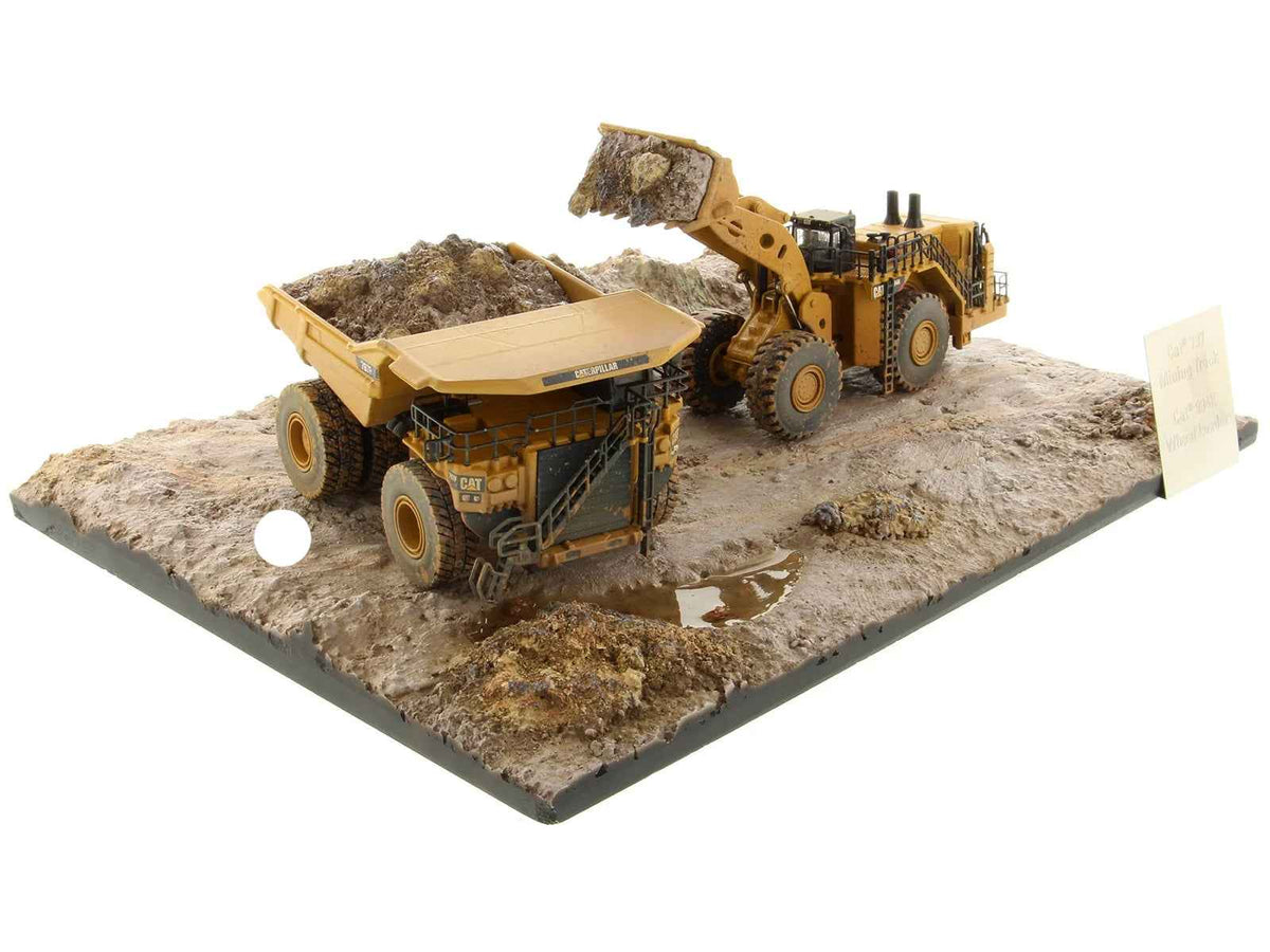 Weathered yellow Cat Caterpillar 994K wheel loader and 797 mining truck diecast models by Miniature Motors, set of 2.