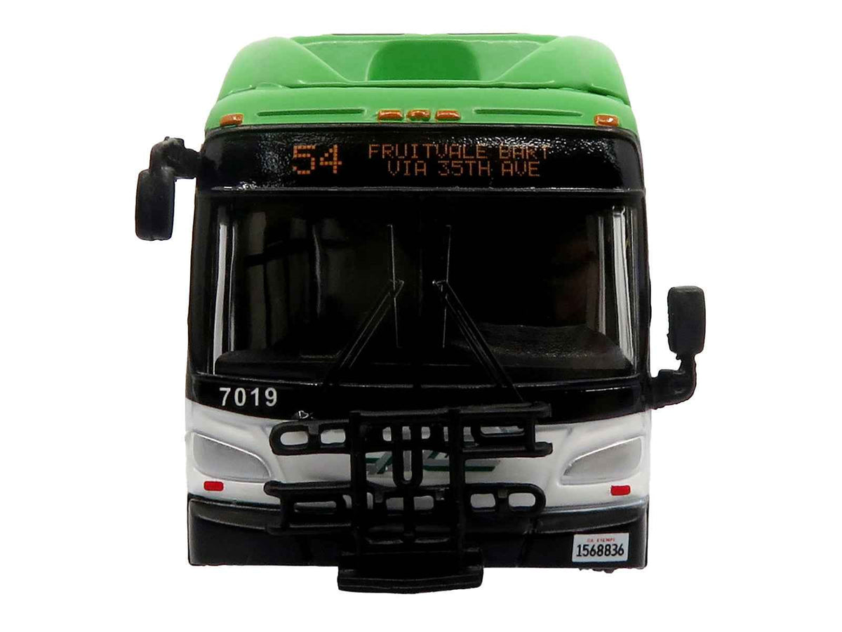 Miniature Motors New Flyer Xcelsior XHE40 transit bus diecast model in white and green with graphics, part of The Bus & Motorcoach Collection.