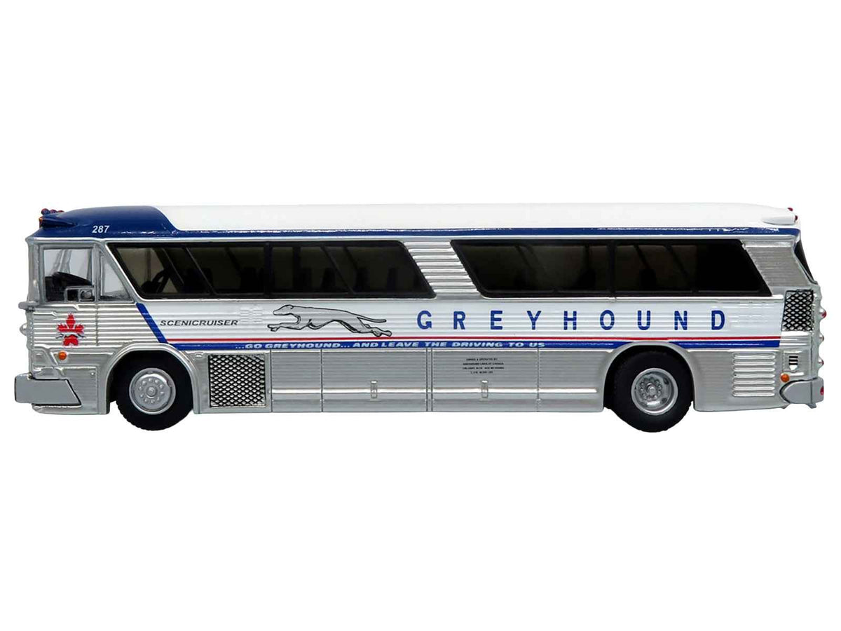 Miniature Motors 1964 MCI MC-5A Greyhound Canada vintage bus diecast model in white with blue stripes, 1/87 scale, limited edition.