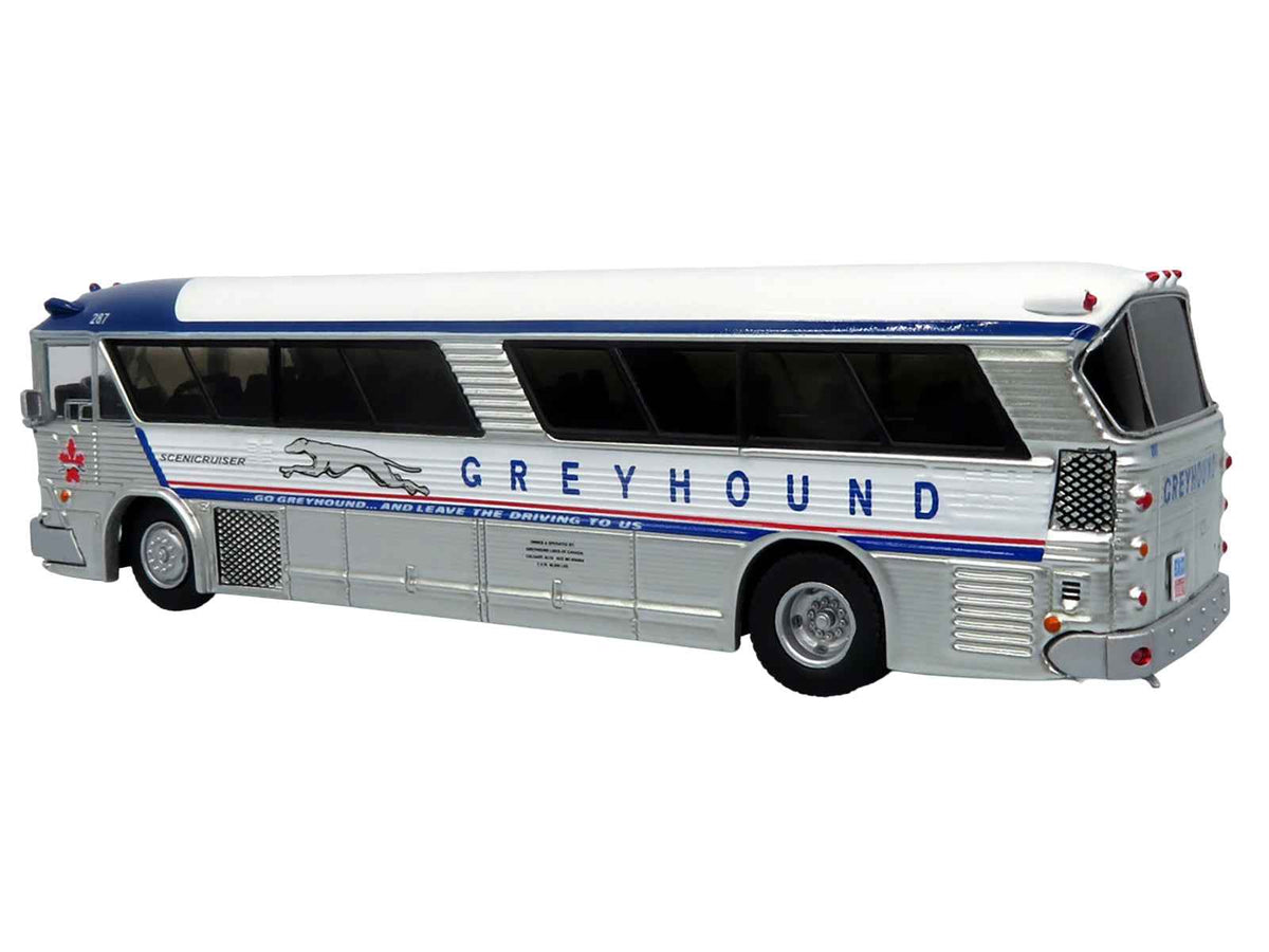 Miniature Motors 1964 MCI MC-5A Greyhound Canada vintage coach bus diecast model in white with blue stripes, 1/87 scale.