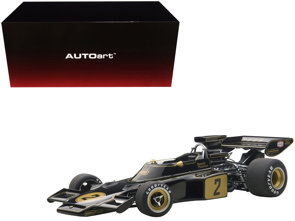 Miniature Motors Lotus 72E 1973 Ronnie Peterson #2 1/18 scale model car by Autoart, detailed replica of classic racing vehicle